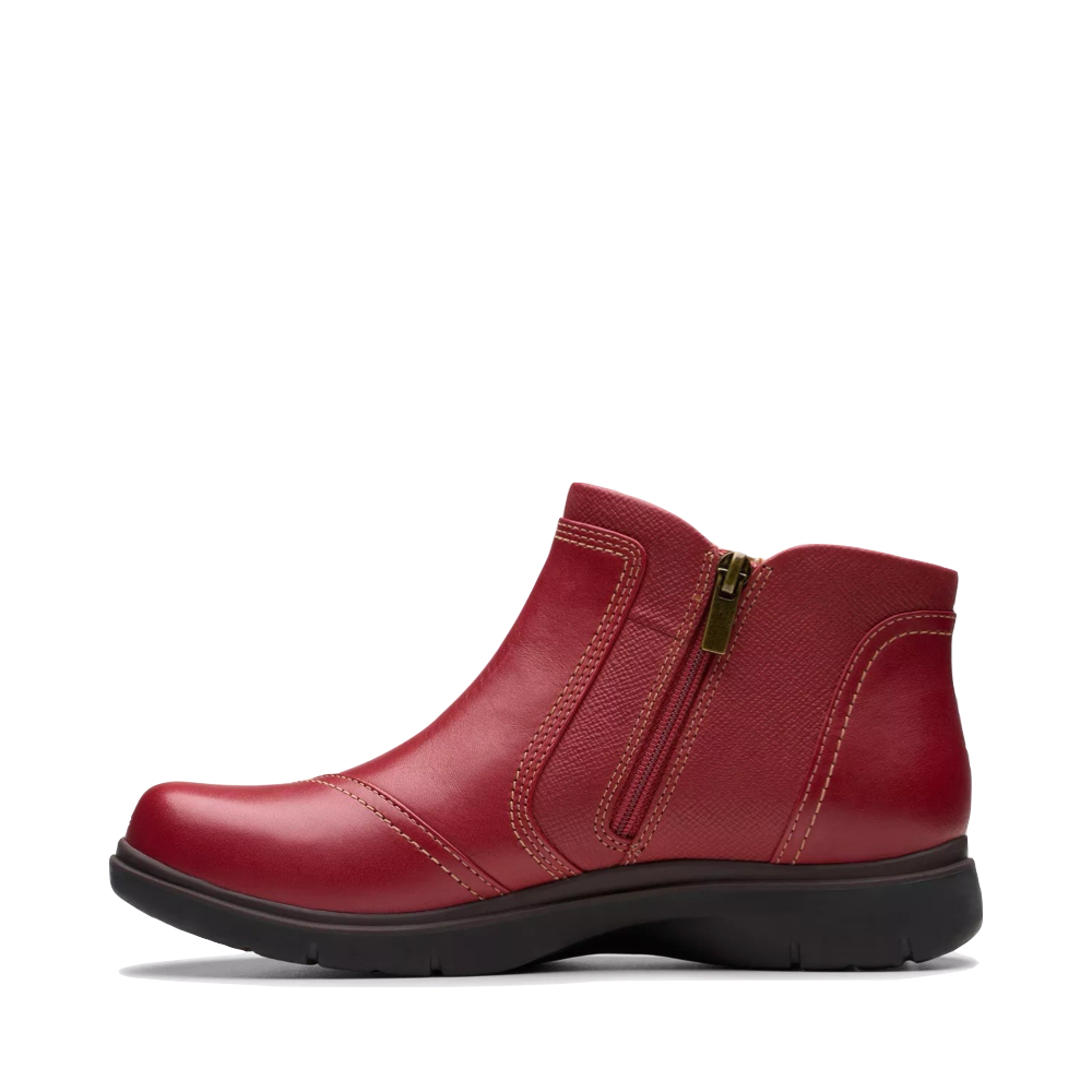 Clarks patent ankle boots on sale