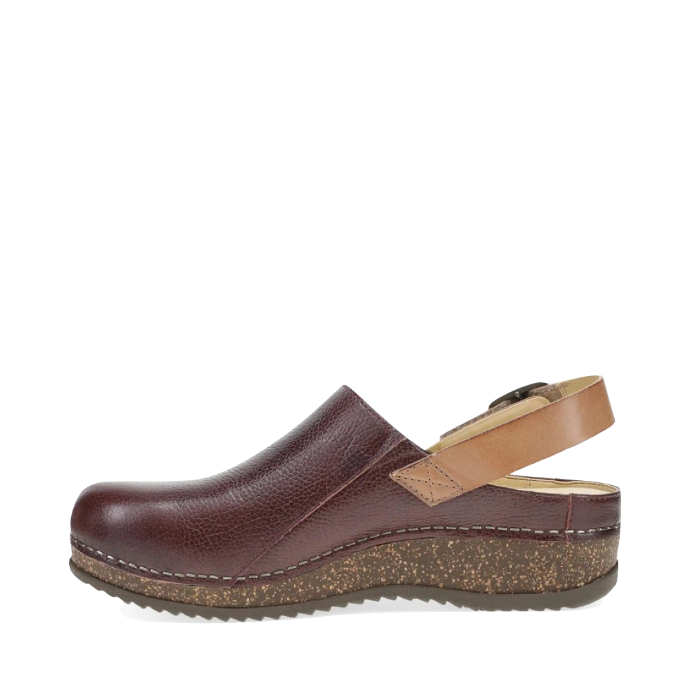 Side (left) view of Dansko Merrin Sling Back Clog for women.