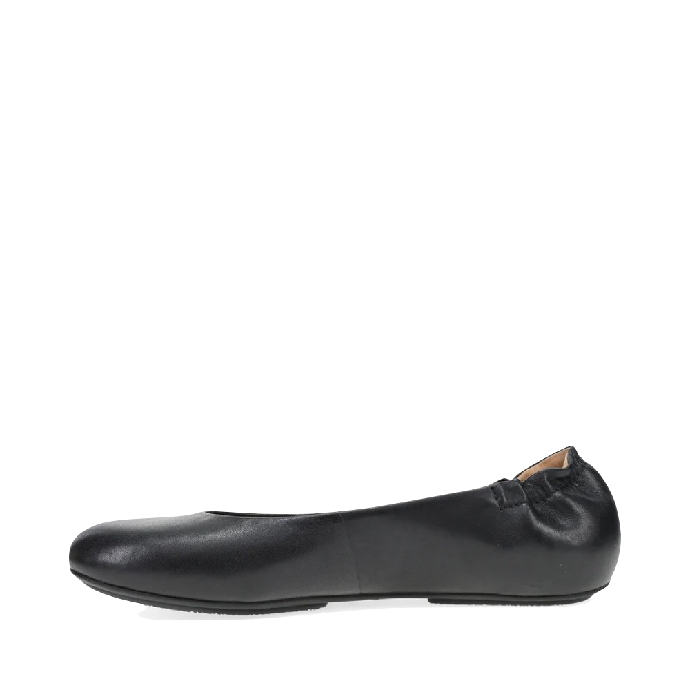 Side (left) view of Dansko Mollie Slip On Flat for women.