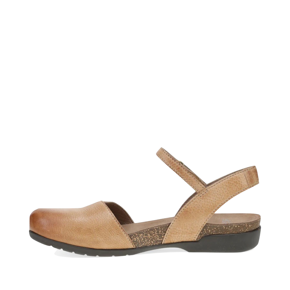 Side (left) view of Dansko Rowan Closed Toe Sandal for women.