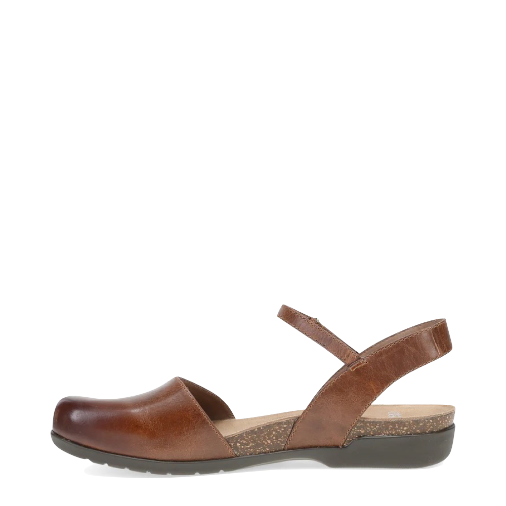 Side (left) view of Dansko Rowan Closed Toe Sandal for women.