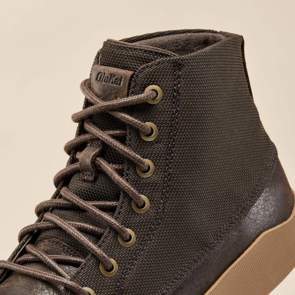 Close-up view of OluKai Molina Leather Boos for men.