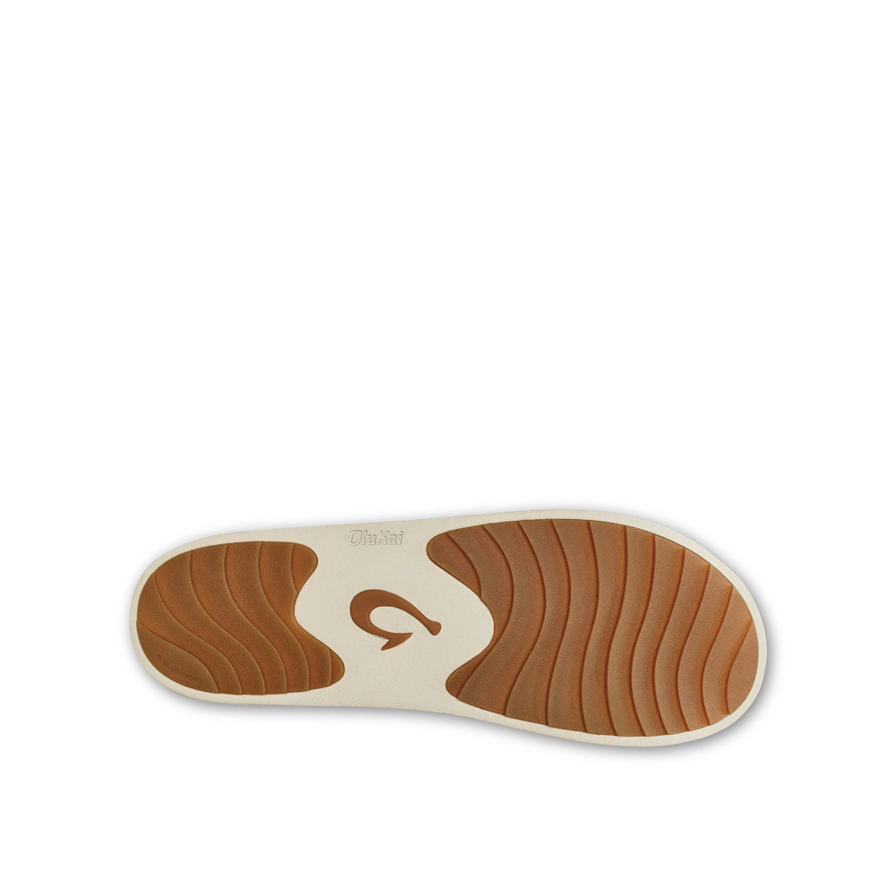 Bottom view of OluKai Ku'i Shearling Lined Slip On Clog Slippers for women.