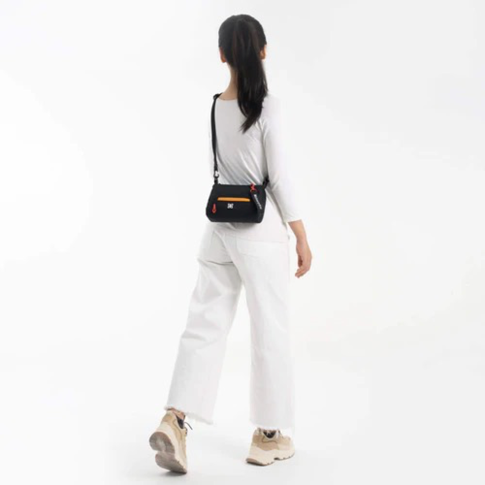 Model view of Sherpani Skye Mini Crossbody Bag.