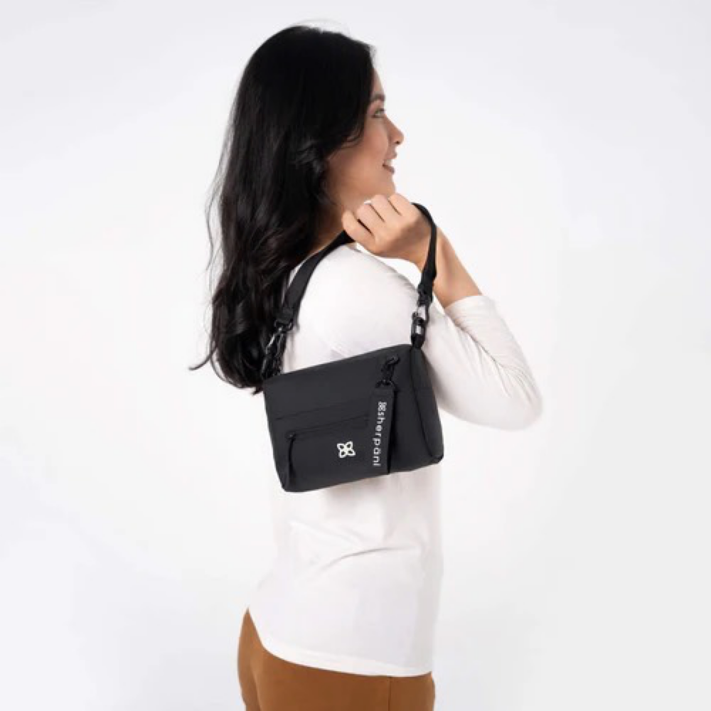 Model view of Sherpani Skye Mini Crossbody Bag.