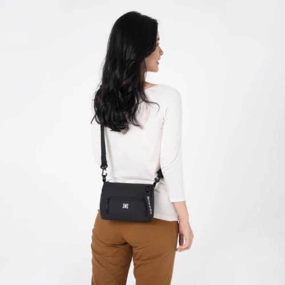 Model view of Sherpani Skye Mini Crossbody Bag.