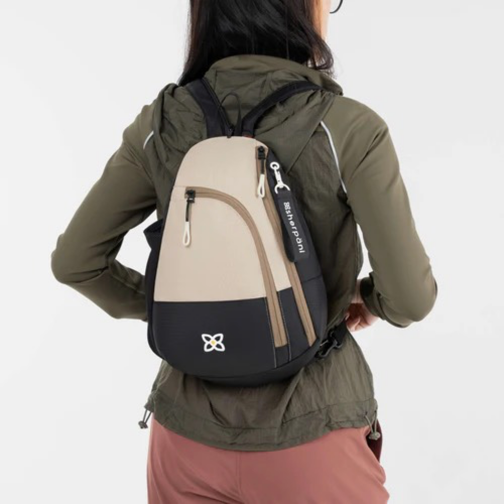 Model view of Sherpani Wayfarer Convertible Sling Backpack.