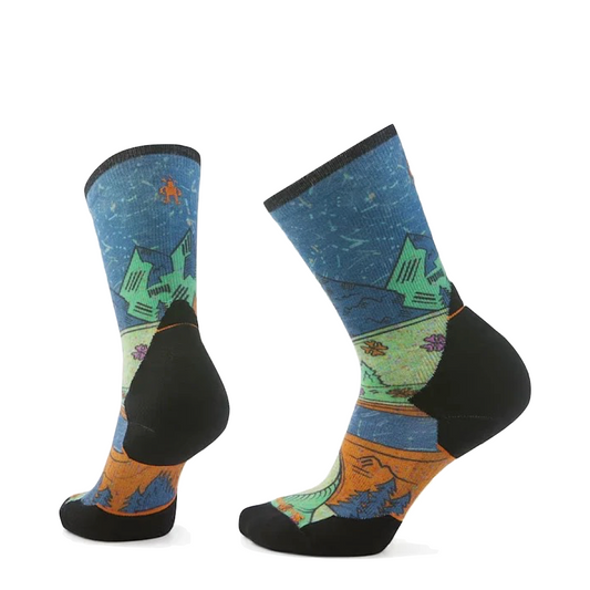 Side (left) and bottom view of Smartwool Targeted Cushion Trail Run Mountain Print Crew Socks for women.